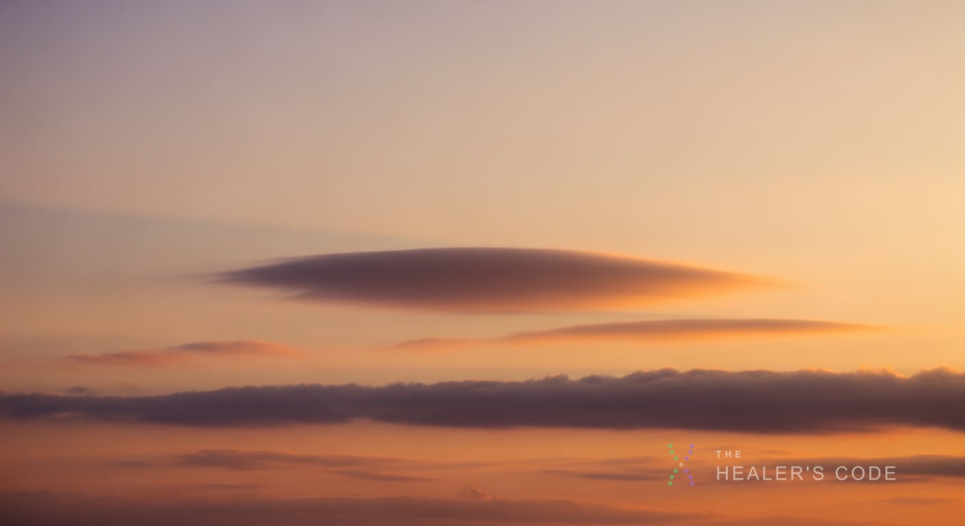Clouds drifting across an open sky, illustrating thoughts passing through awareness