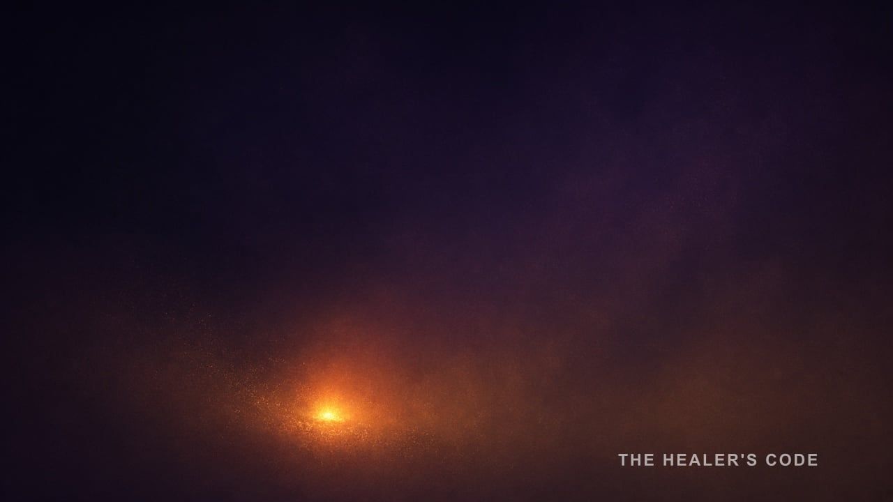 A single gold ember melting into darkness, with empty space above it