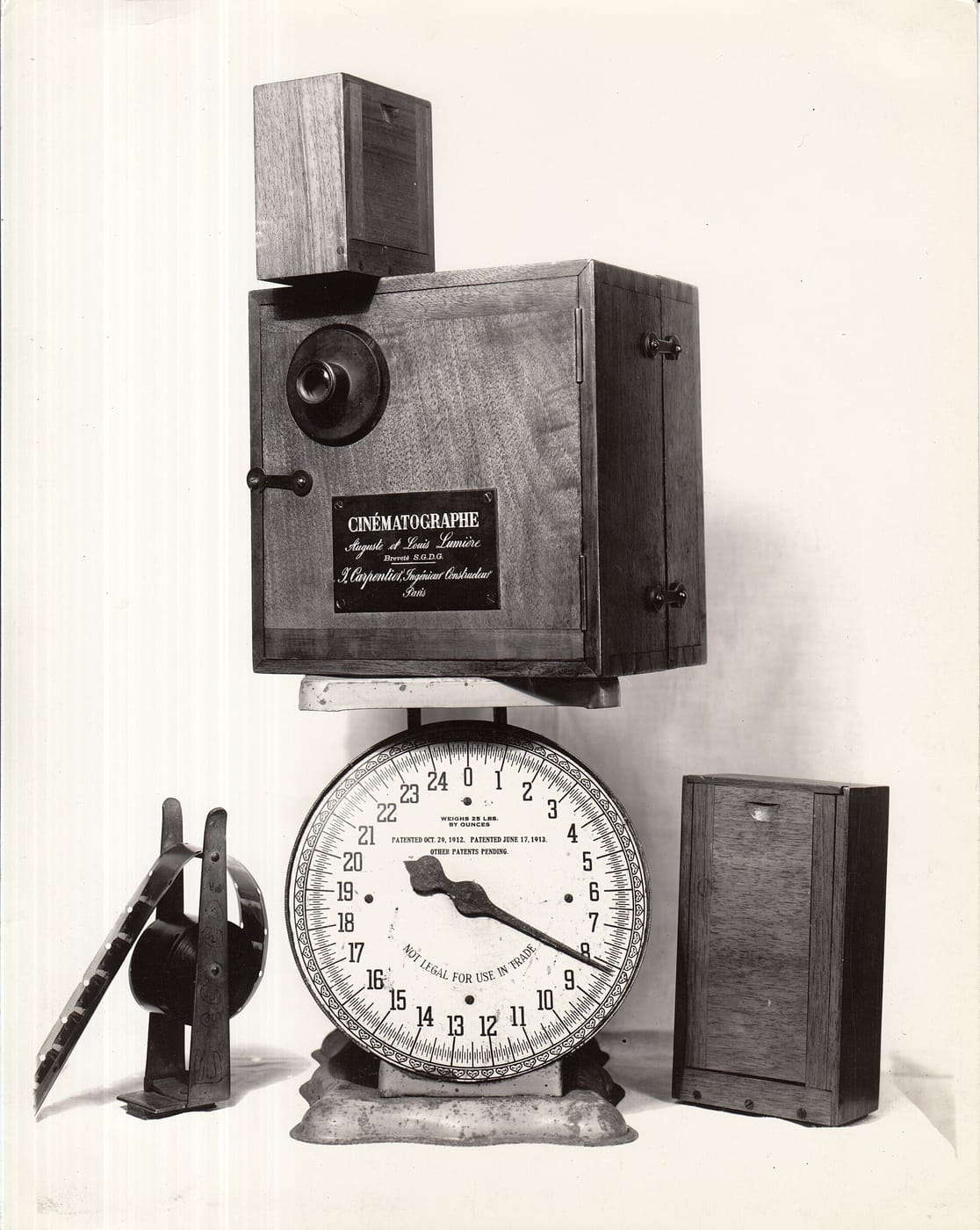 Cinematographe Lumiere motion picture projector, a movie projected on a wall