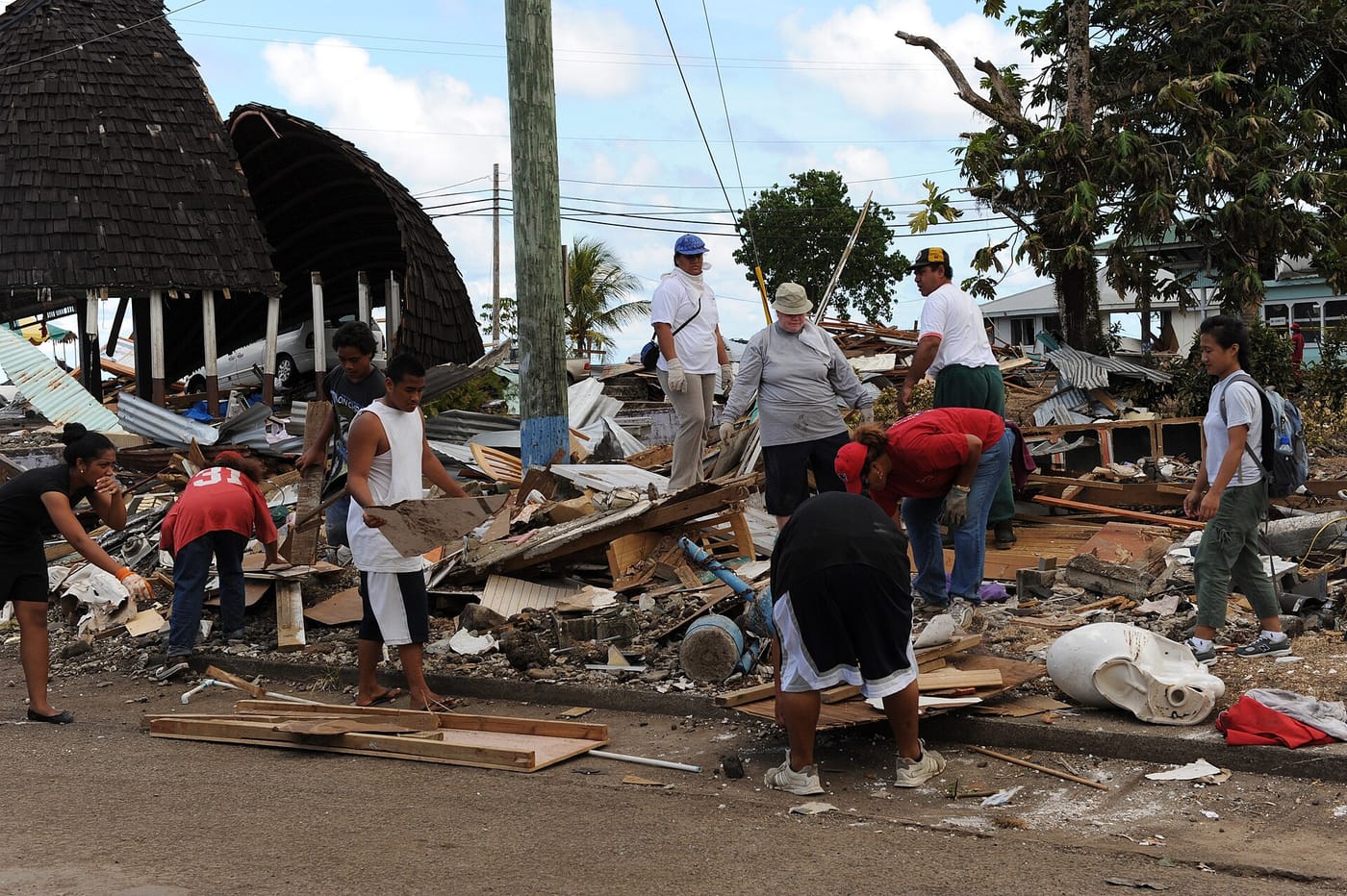 Volunteers helping neighbors after a storm, American Samoa