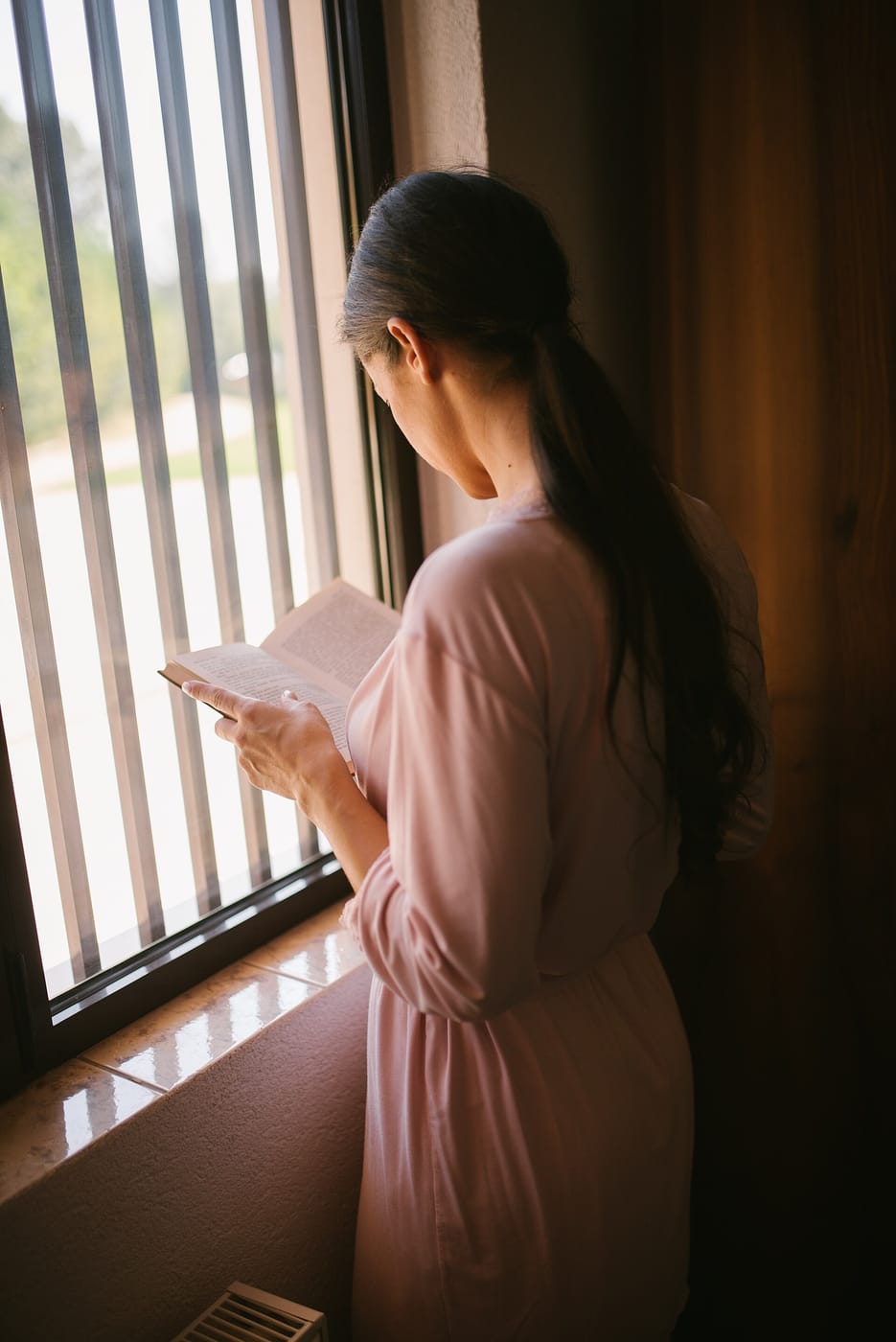 Reading by a window