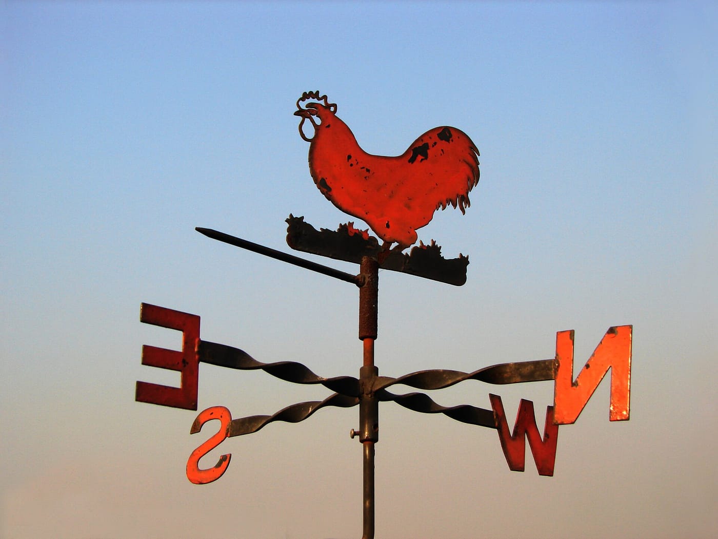 A rooster weather vane