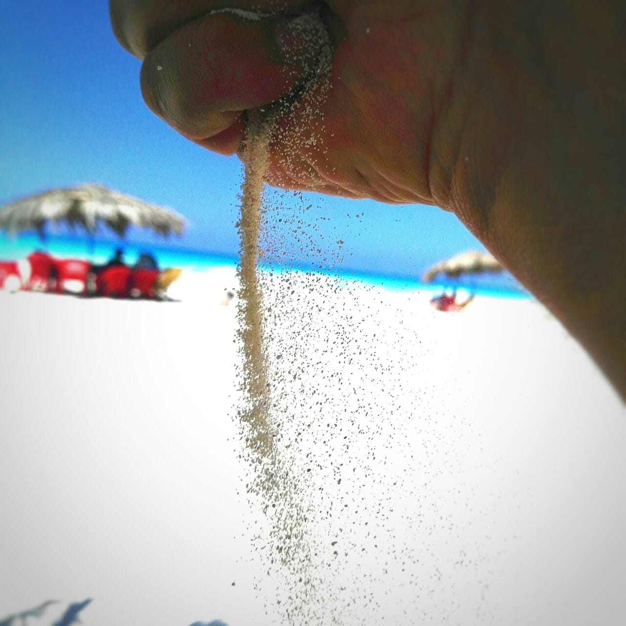 Sand falling from an open hand